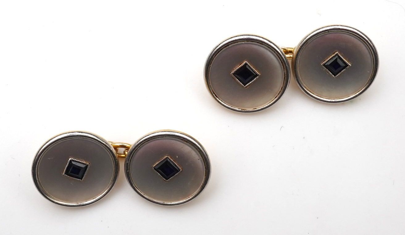 A pair of mother of pearl and sapphire cufflinks, early 20th century